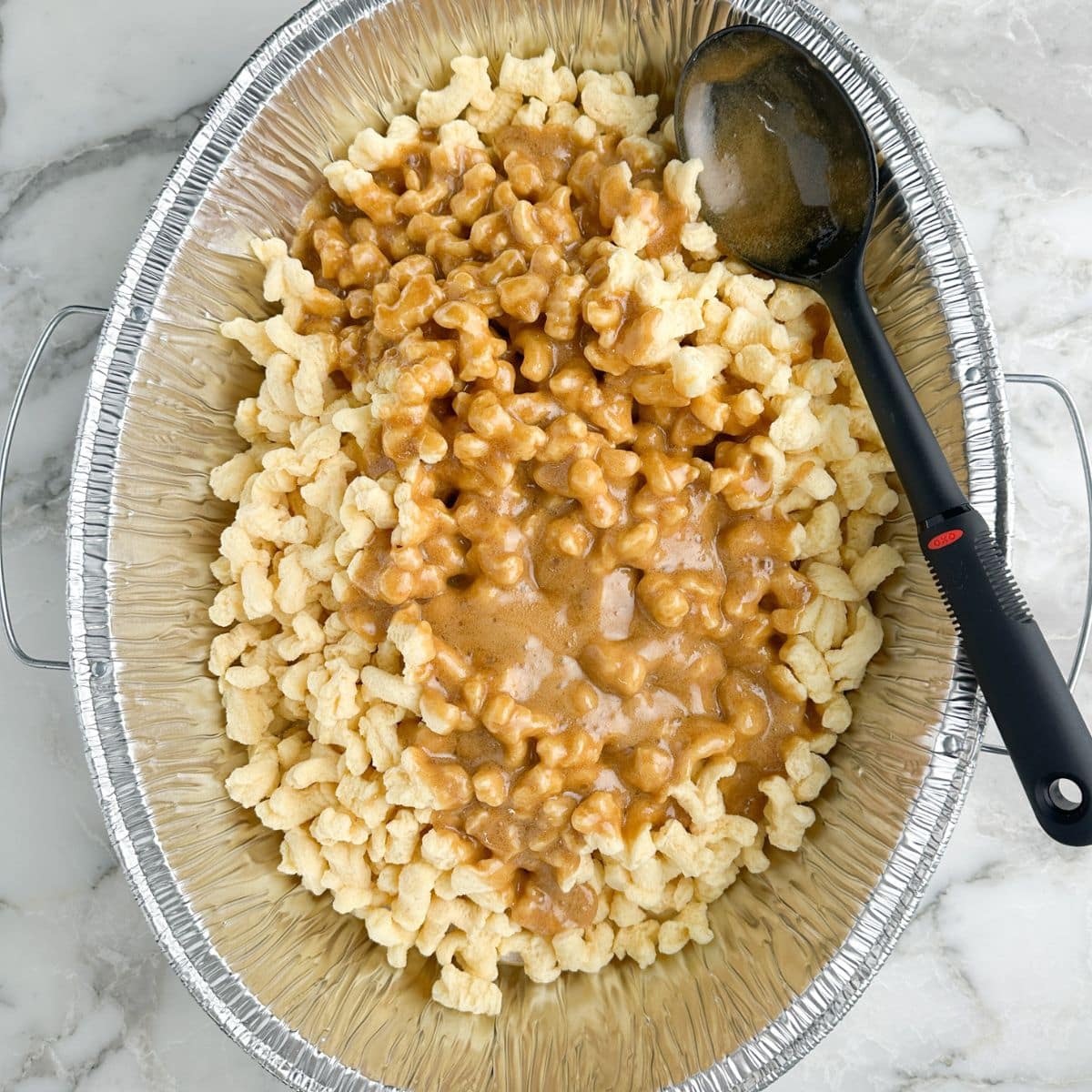 Bowl with puffcorn and caramel sauce. 