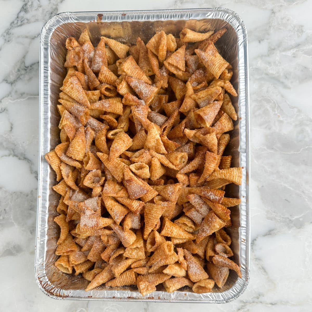 Pan with cinnamon sugar bugles.