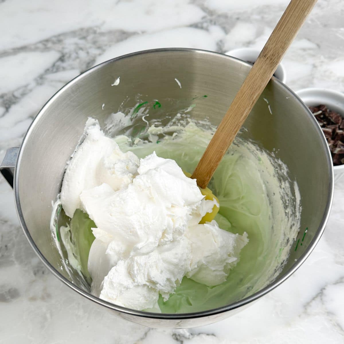 Bowl with cream cheese and whipped topping.