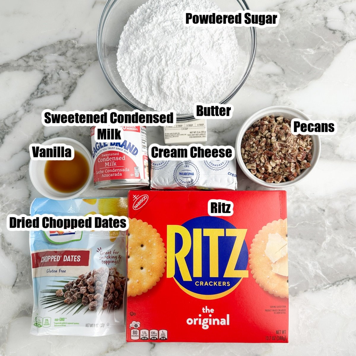 Bowl of powdered sugar, Ritz crackers, dates, pecans, sweetened condensed milk, cream cheese, and butter.