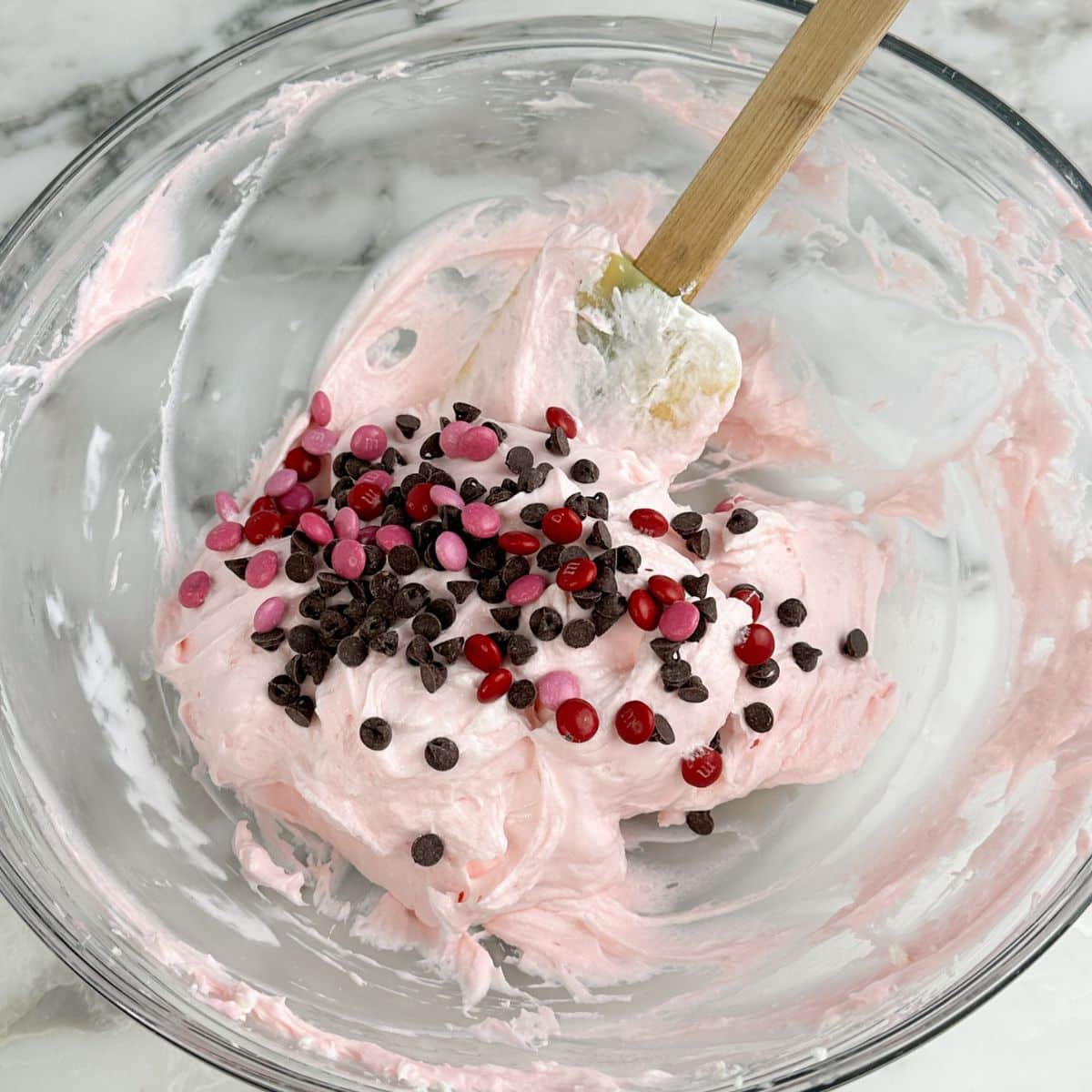 Pink dip with mini chocolate chips and mini M&M's. 