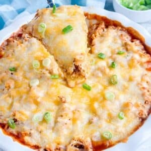 Chicken tamale pie and a piece on a serving spoon.