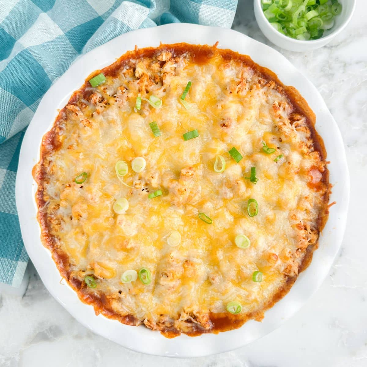 Baked chicken tamale pie in a baking dish.