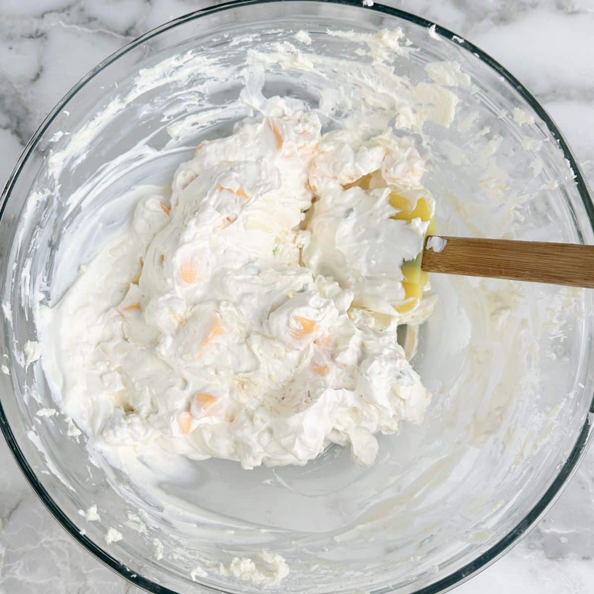 Bowl of sour cream and cream cheese.