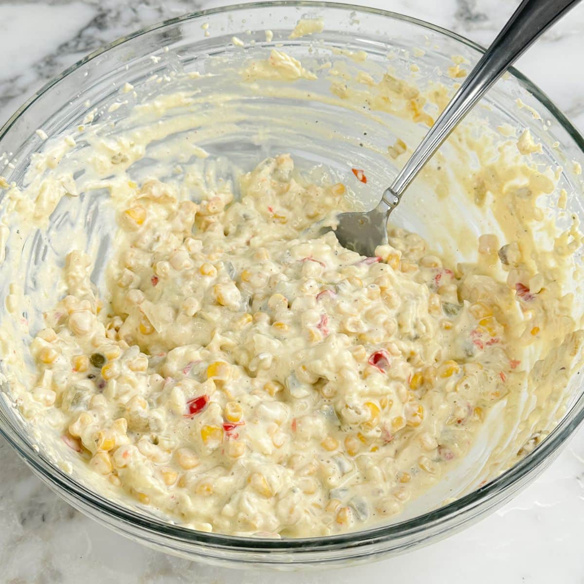 Bowl with cream cheese corn mixture.