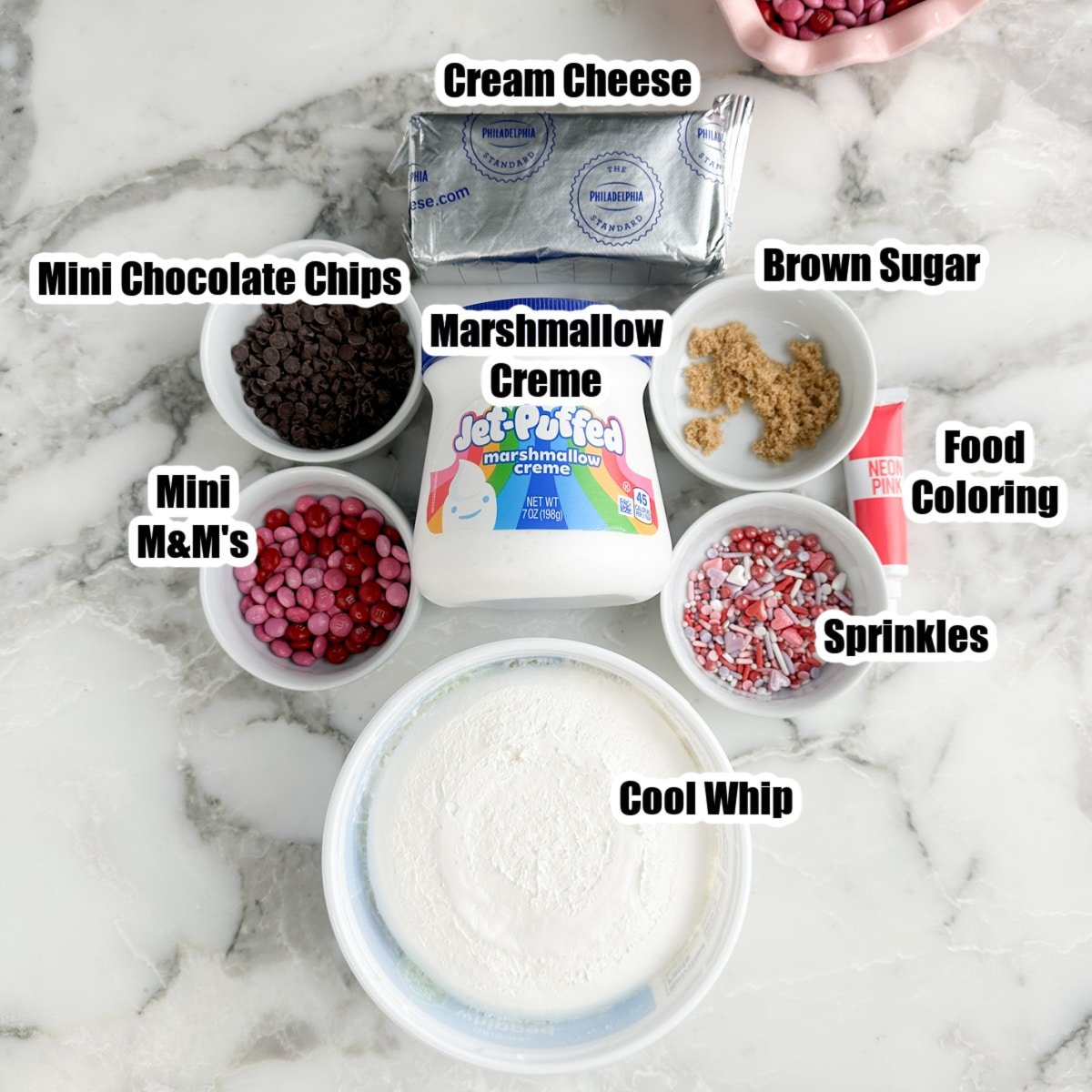 Cream cheese, Cool Whip, bowl of brown sugar, sprinkles, chocolate chips, and marshmallow creme. 
