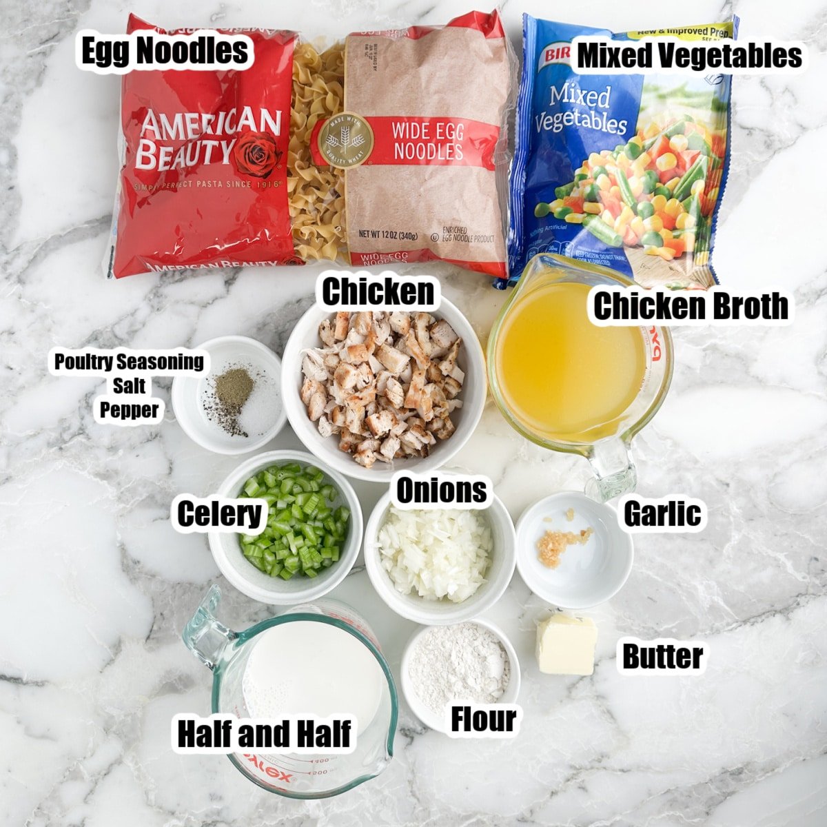 Bag of egg noodles, mixed vegetables, bowl of chicken, broth, half and half, seasonings, celery, onion, garlic, and butter.