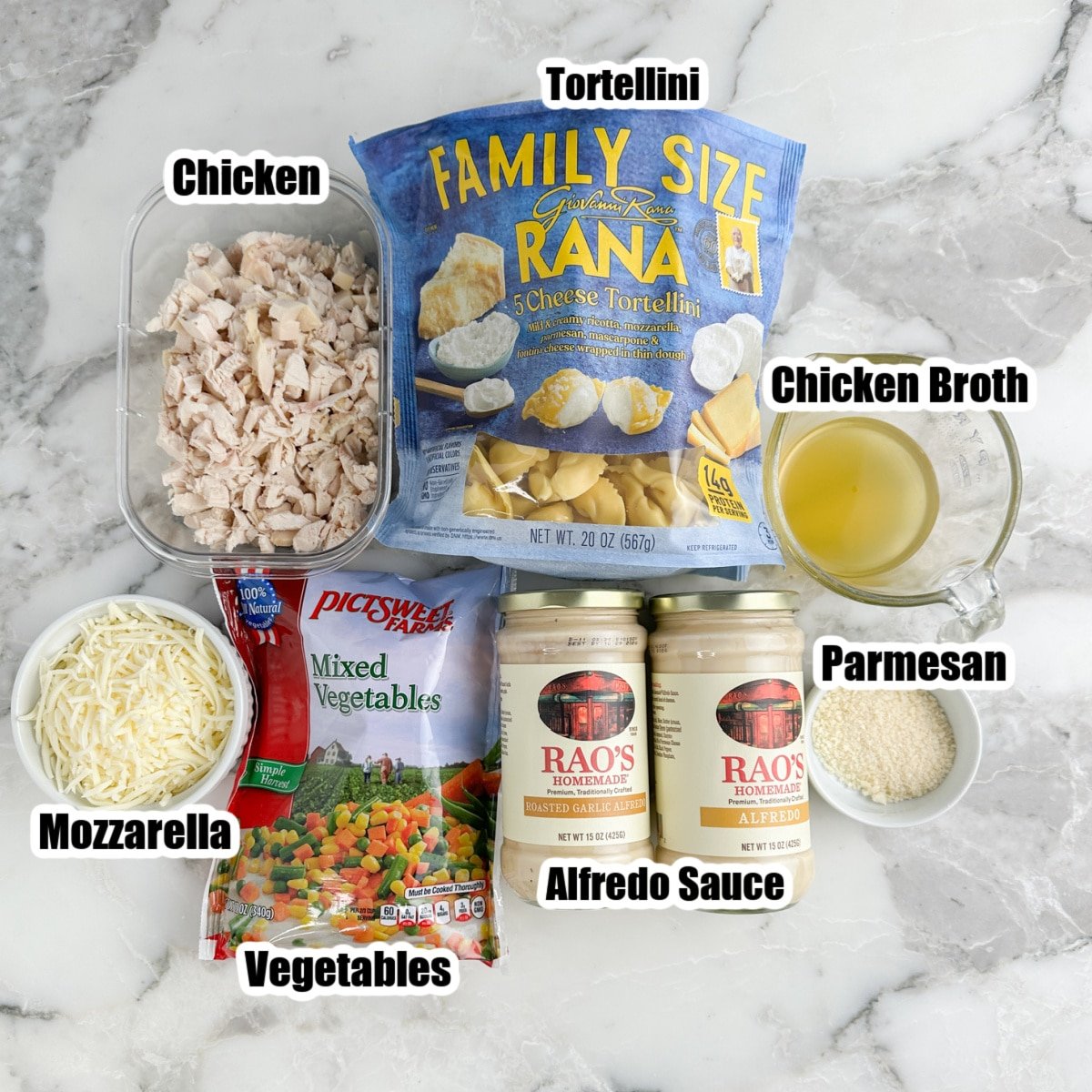 Bag of tortellini, shredded chicken, jarred alfredo sauce, shredded cheese, and frozen vegetables. 