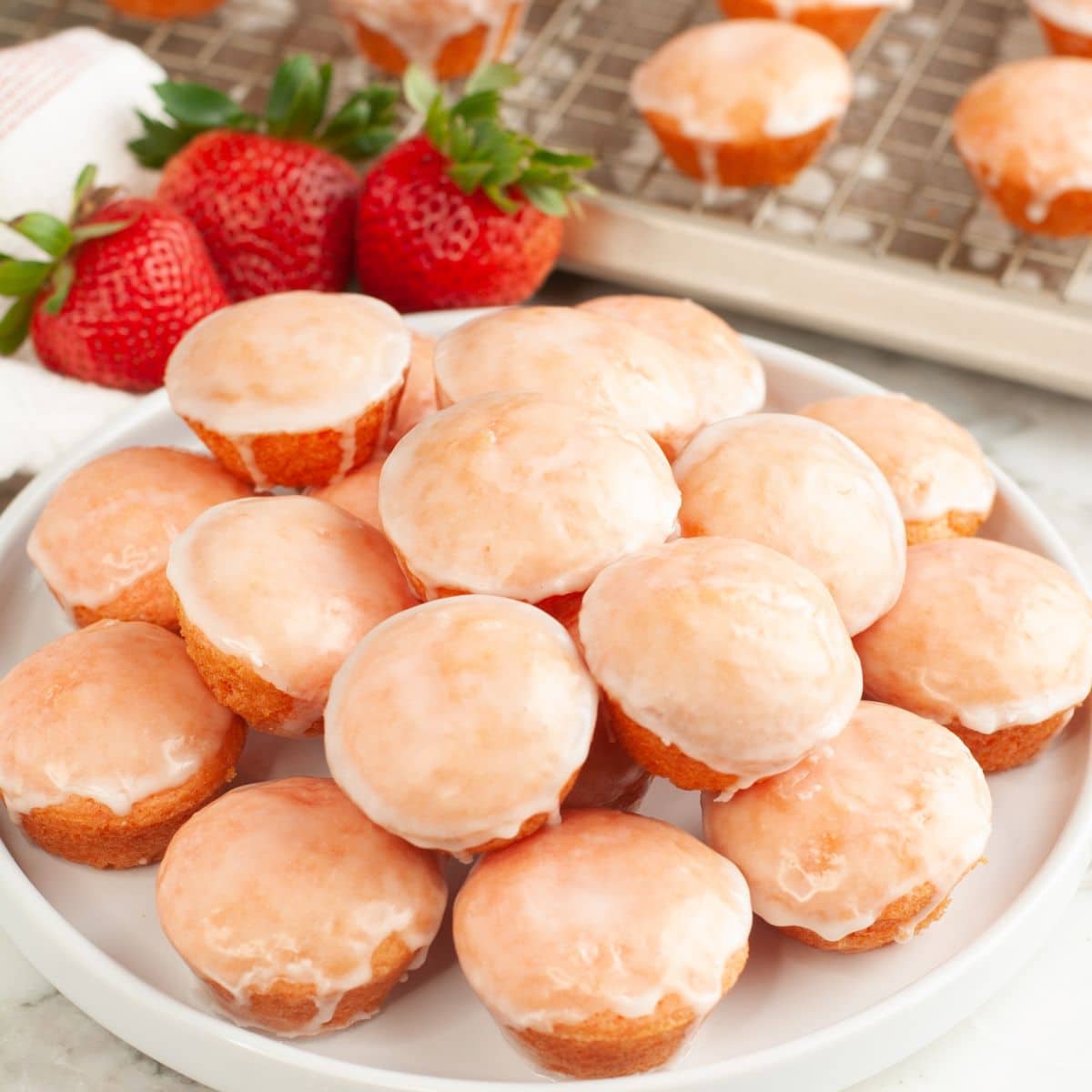 Plate of strawberry blossoms mini cakes. 