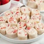 Plate of strawberry pinwheels.