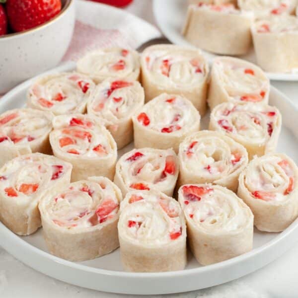 Plate of strawberry pinwheels.