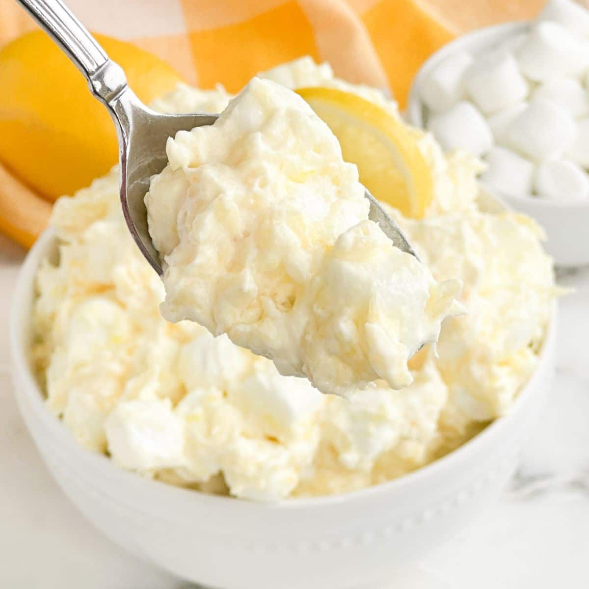 Spoon with lemon fluff. 