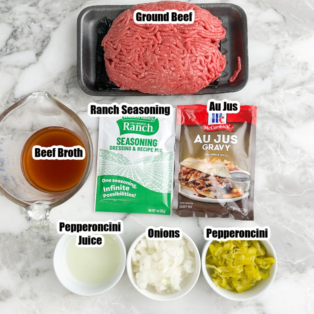 Ground beef, beef broth, packet of ranch seasoning, au jus, bowl of onion, and pepperoncinis. 