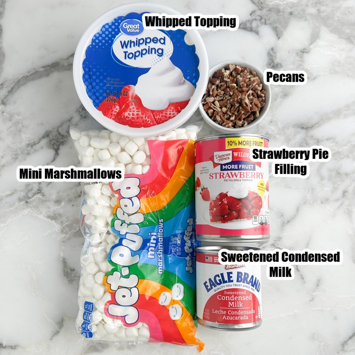 Whipped topping, chopped pecans, mini marshmallows, strawberry pie filling, and sweetened condensed milk. 