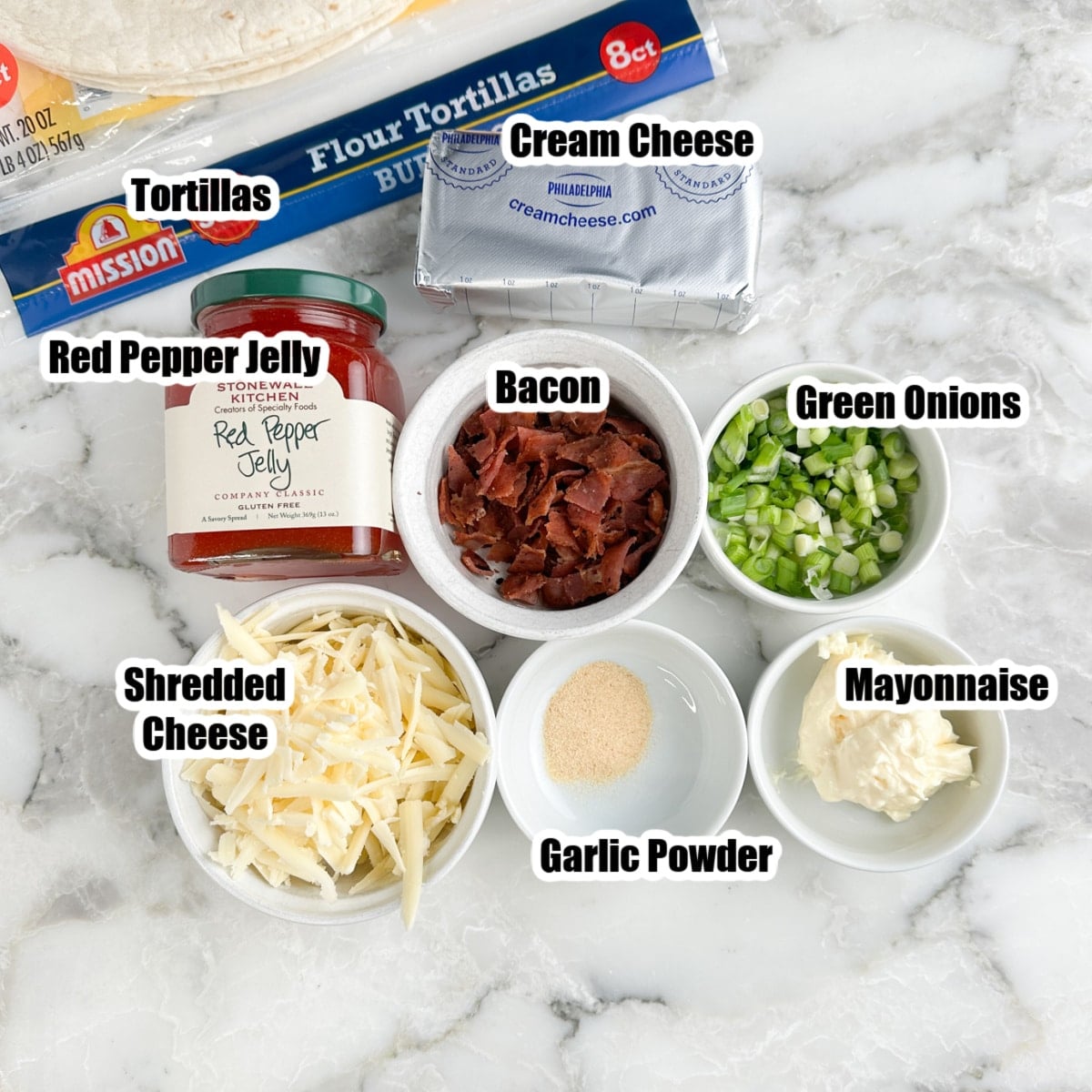 Jar of pepper jelly, tortillas, crumbled bacon, shredded cheese, cream cheese, mayonnaise, garlic powder, and green onions. 