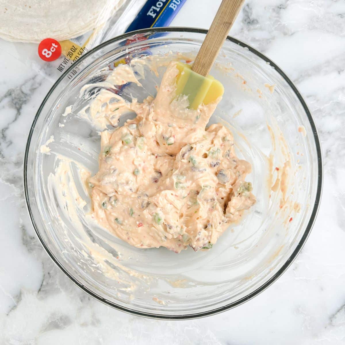 Bowl of pepper jelly cream cheese mixture. 