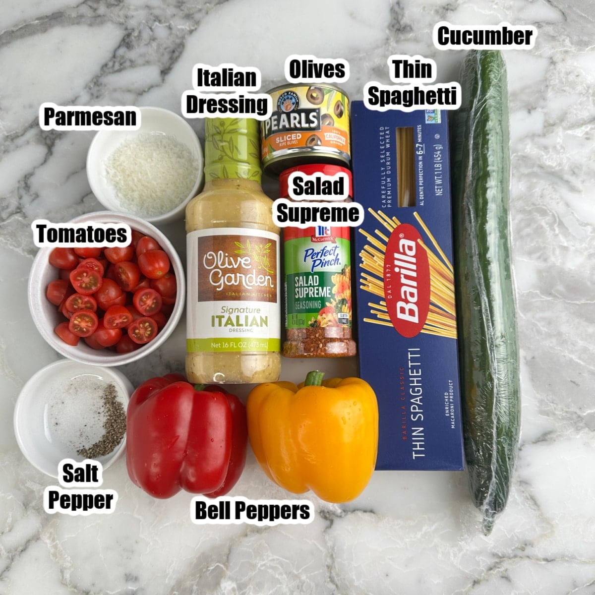 Cucumber, spaghetti, Italian dressing, Salad Supreme, peppers, tomatoes, parmesan. 