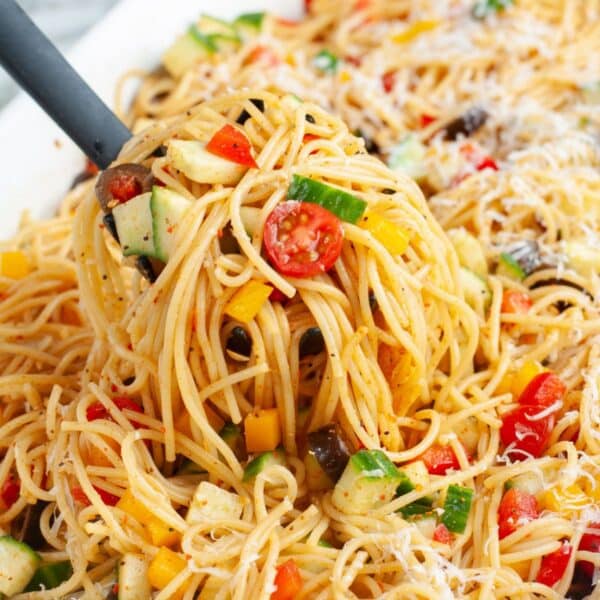 Spoon with spaghetti pasta salad.