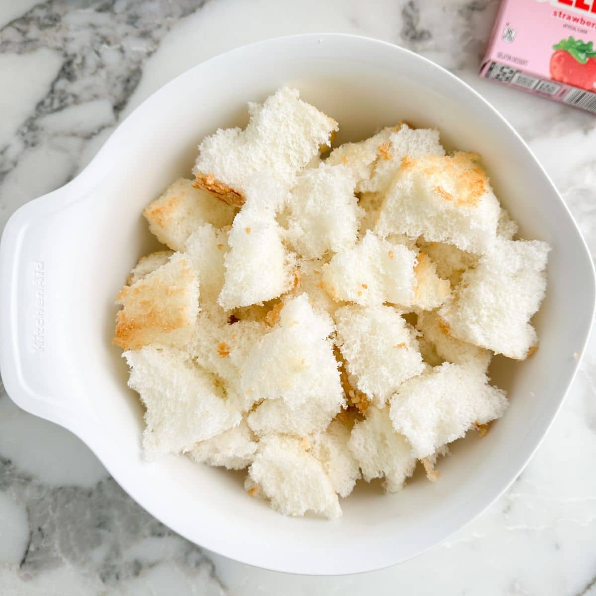 Bowl of pieces of angel food cake. 