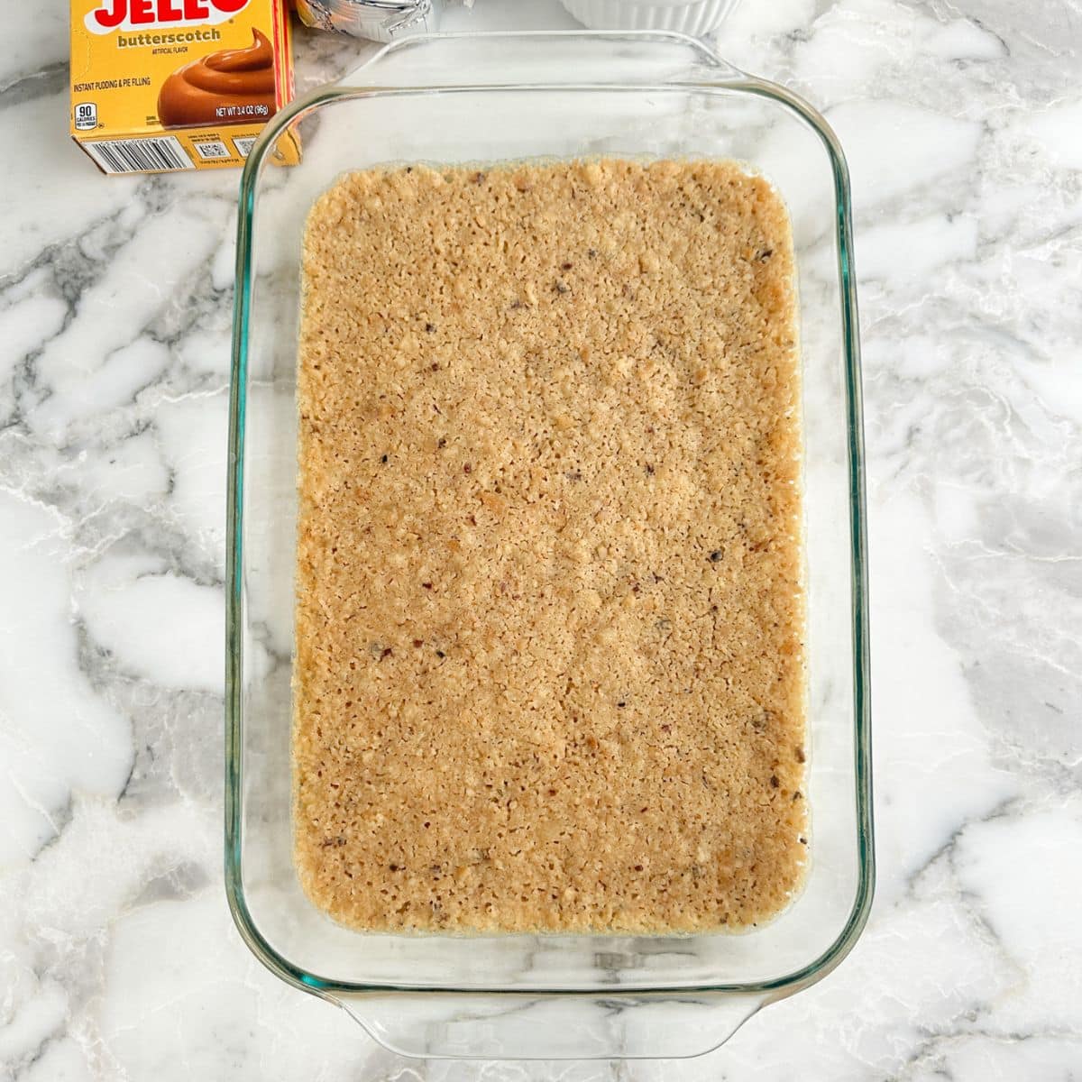 Baking dish with pecan sandie crust.