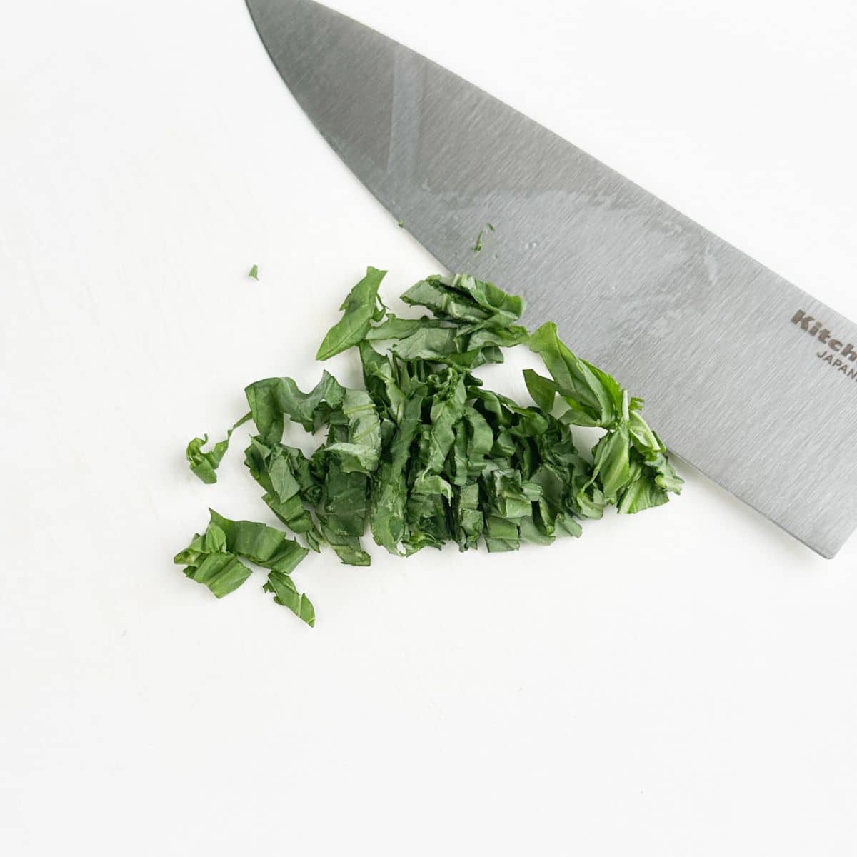 Knife with fresh basil.