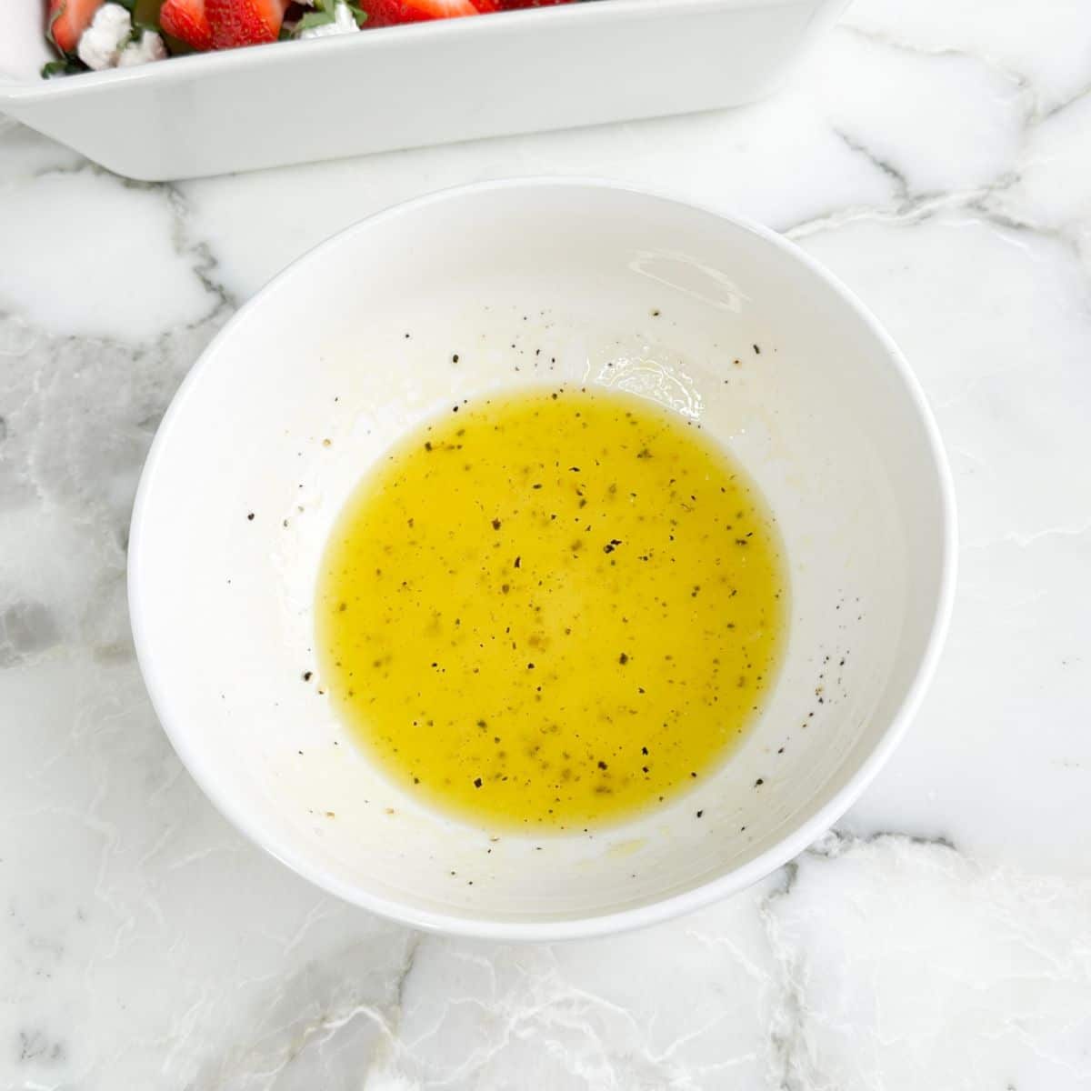 Bowl with vinaigrette. 