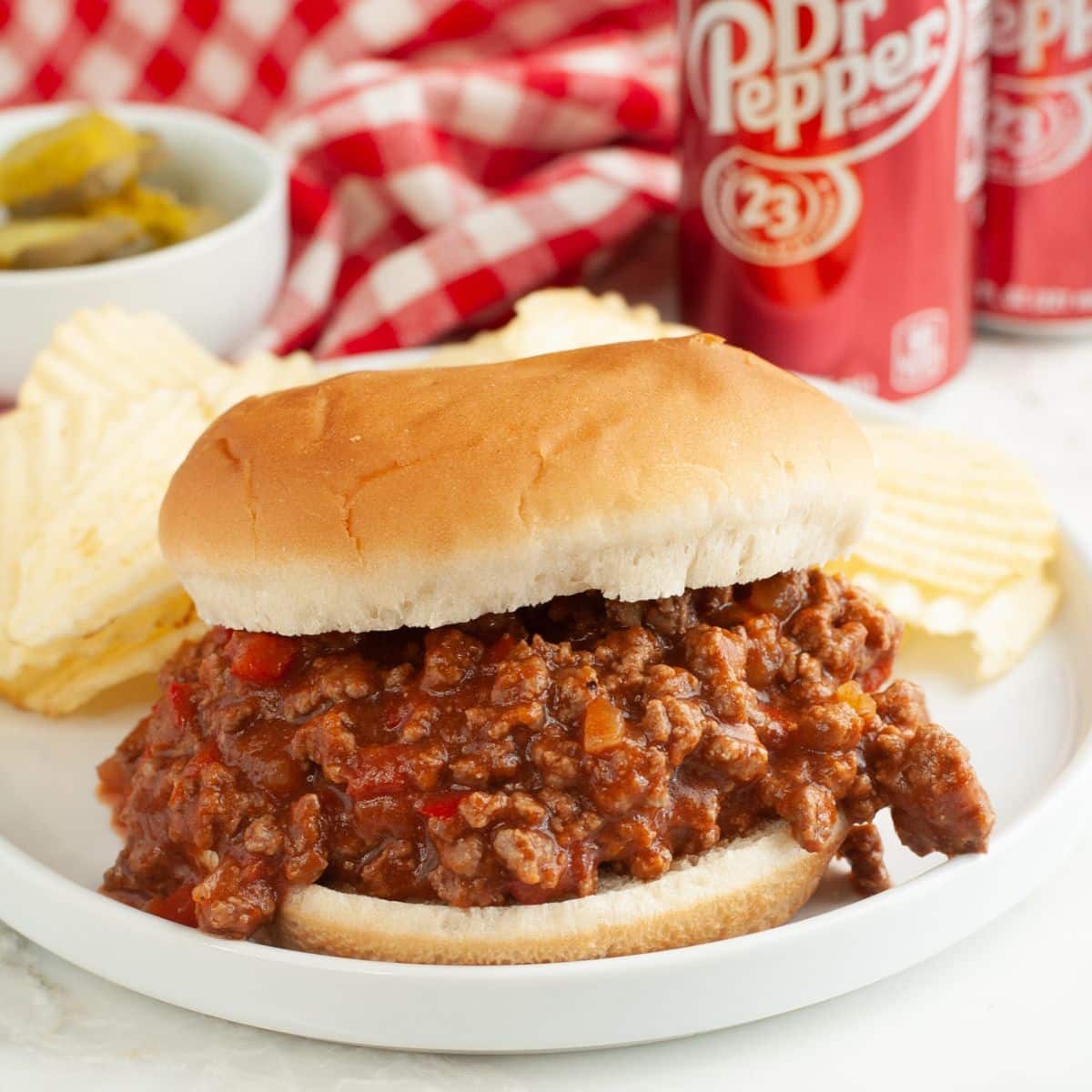 Dr. Pepper sloppy joe sandwich on a plate.