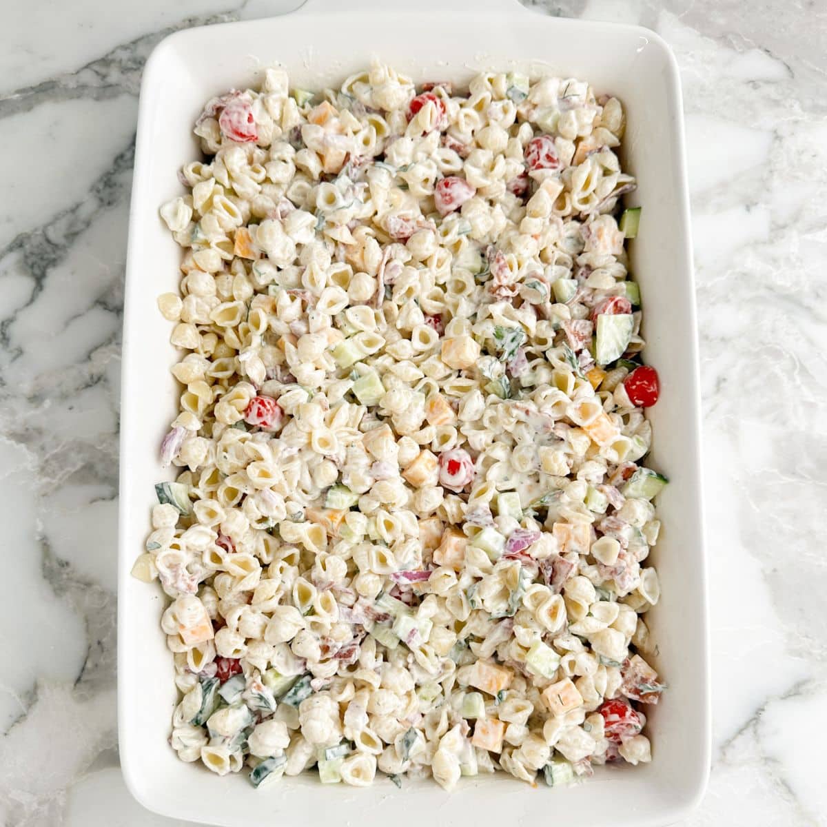 Ranch pasta salad in a casserole dish. 