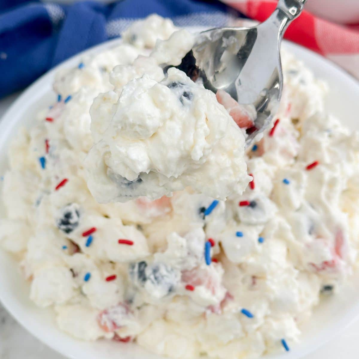 Spoon with cheesecake salad. 