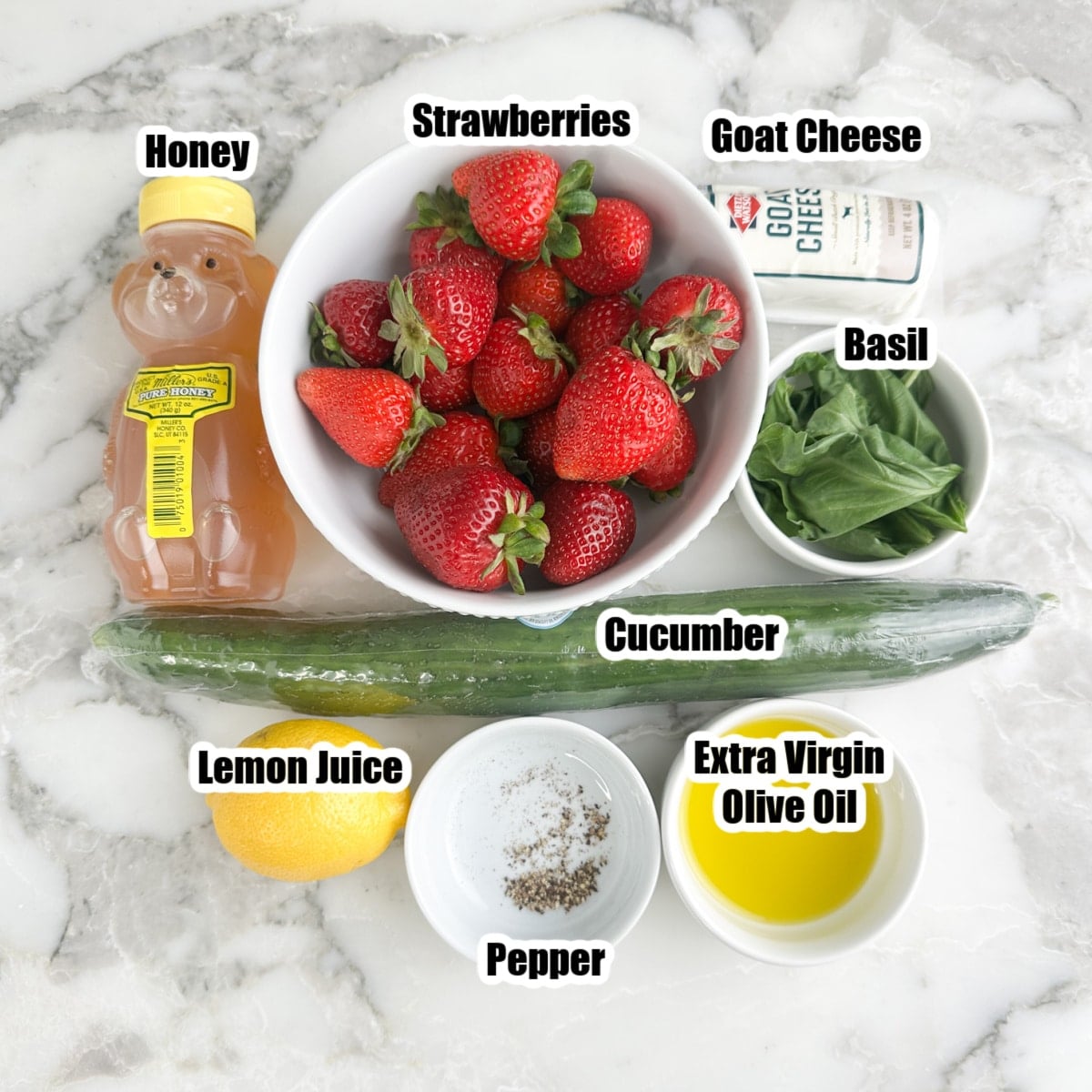 Goat cheese, strawberries, cucumber, basil, lemon, honey, oil, and pepper. 