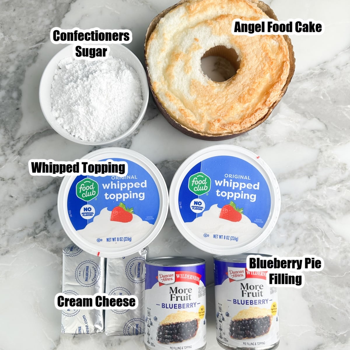 Angel food cake, confectioners sugar, whipped topping, cream cheese, and blueberry pie filling. 