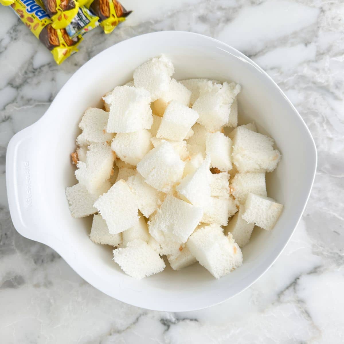 Bowl of cubed angel food cake.
