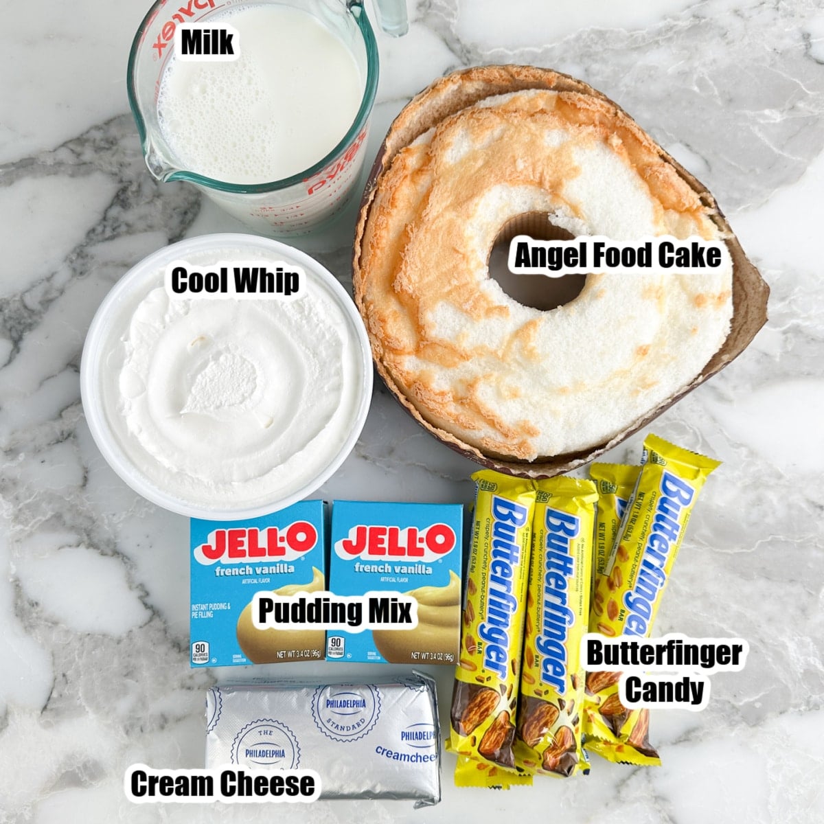 Angel food cake, Cool Whip, milk, pudding mix, Butterfinger candy, and cream cheese.
