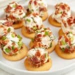 Ritz crackers topped with dill pickle cheese balls.