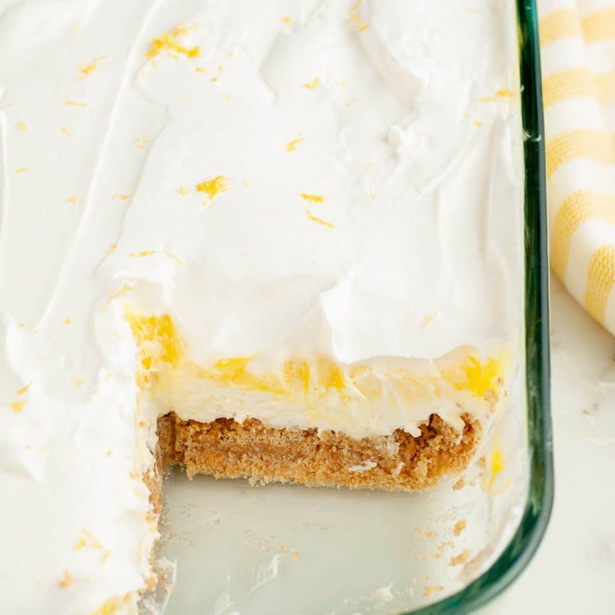 Lemon lush dessert in a baking dish.