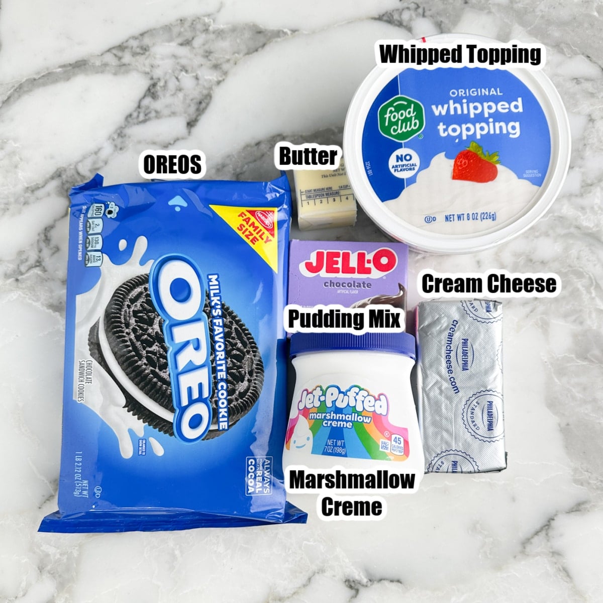 Oreos, whipped topping, butter, marshmallow creme, pudding mix, and cream cheese. 