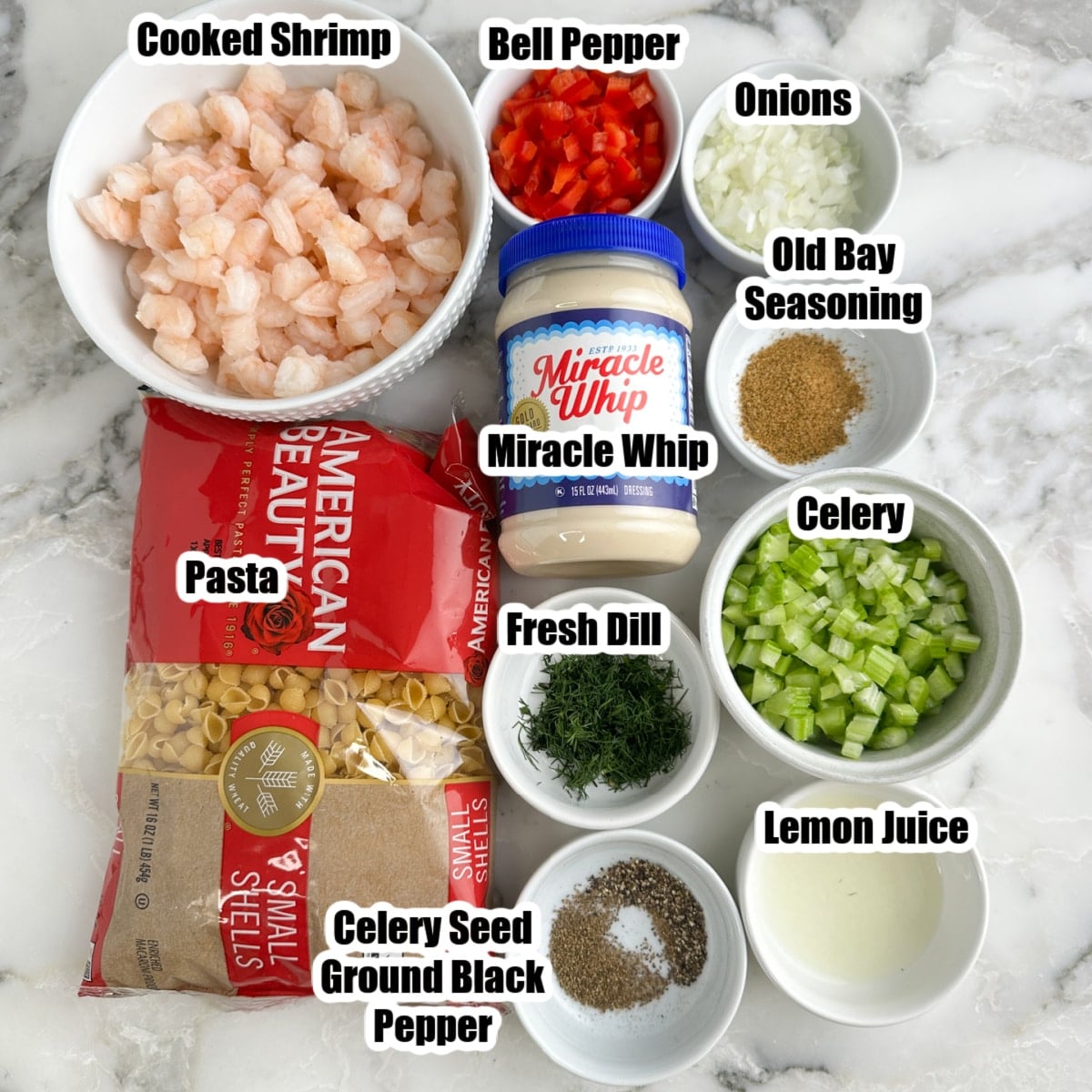 Bowl of cooked shrimp, bag of pasta, Miracle Whip, celery, onions, peppers, seasonings, and dill. 