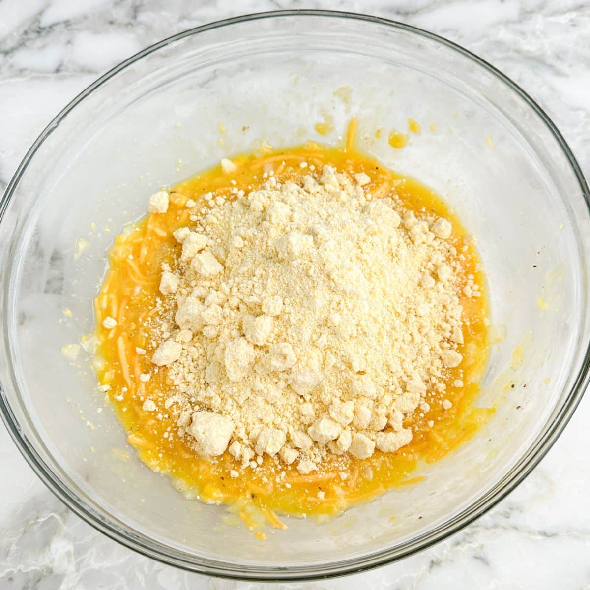 Bowl of Jiffy Corn Muffin mix and creamed corn. 