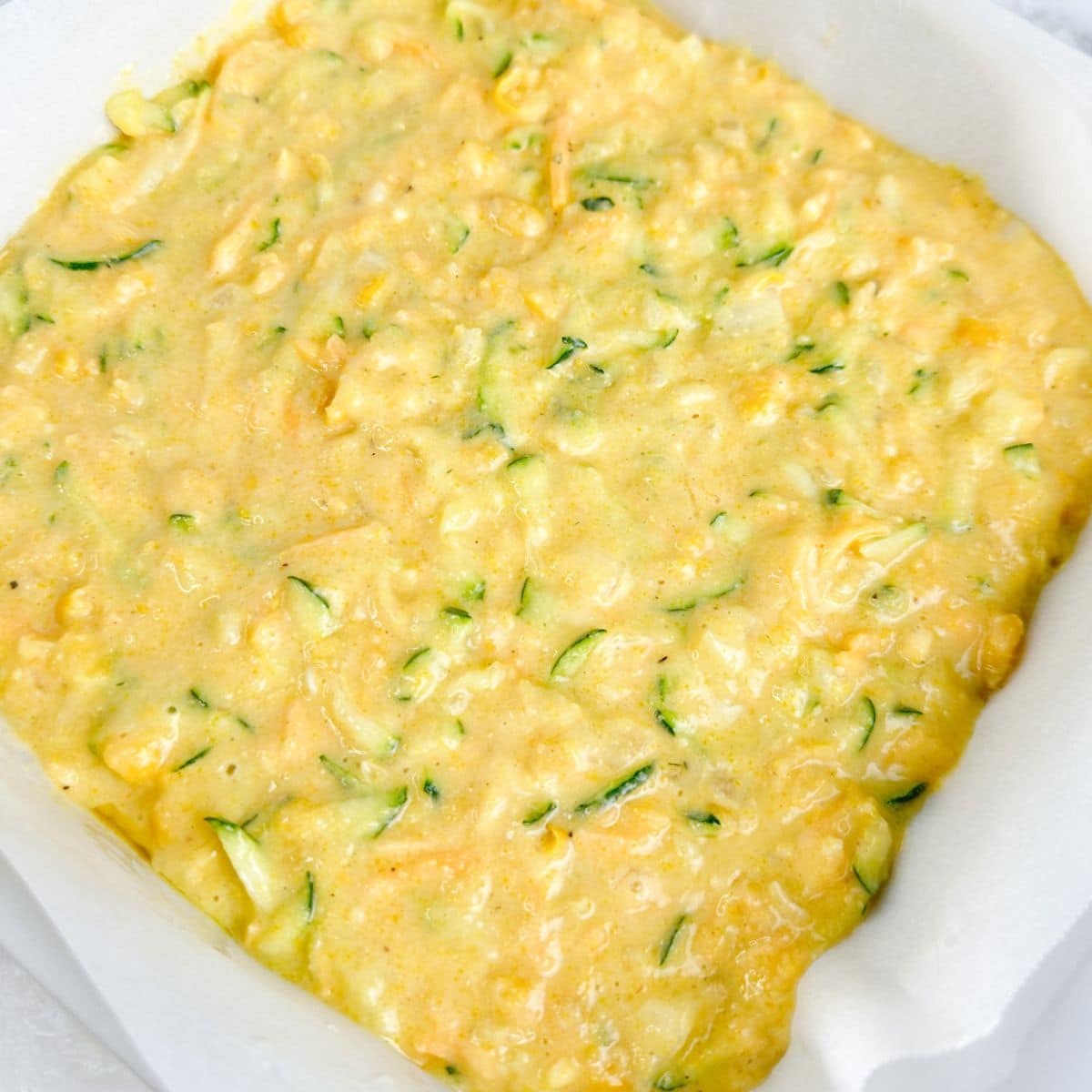 Cornbread batter in a baking dish.