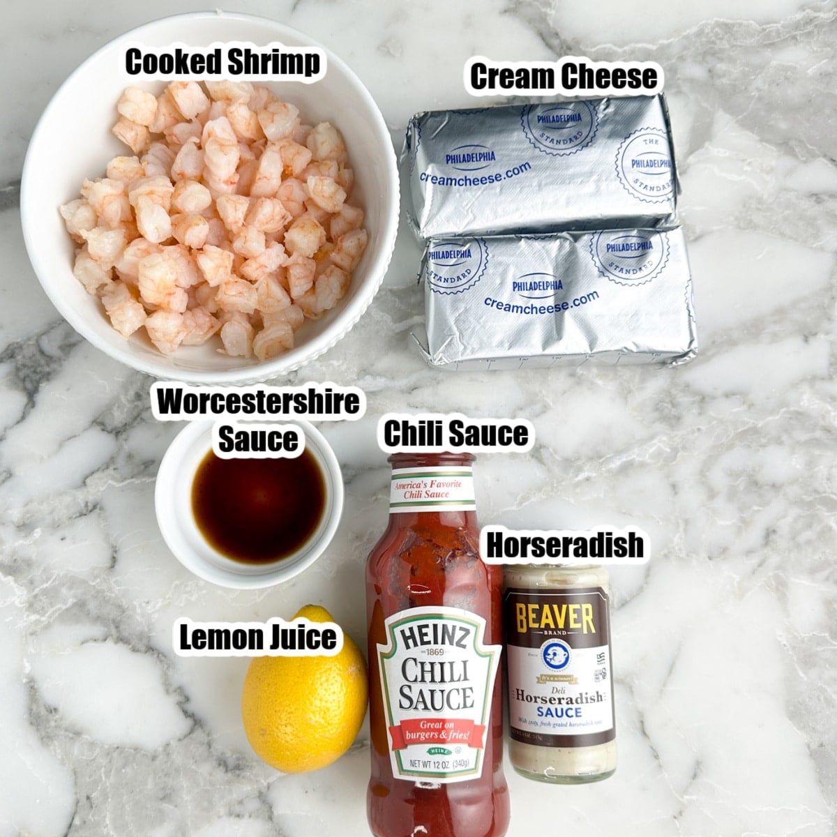 Bowl of cooked shrimp, cream cheese, chili sauce, horseradish, lemon juice, Worcestershire sauce. 