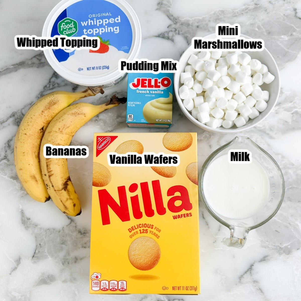 Bananas, whipped topping, pudding mix, vanilla wafers, milk, and mini marshmallows.