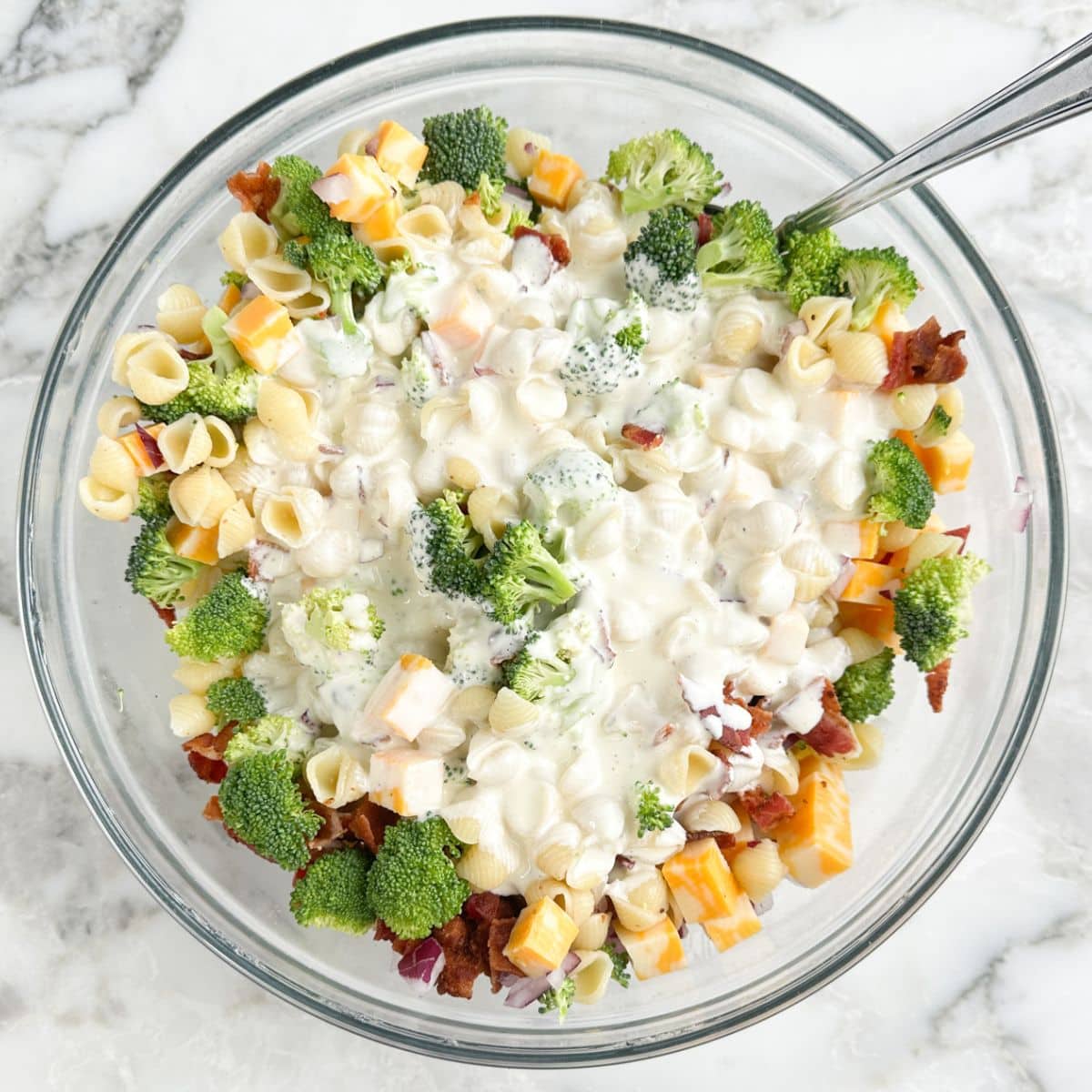 Bowl with broccoli pasta salad. 