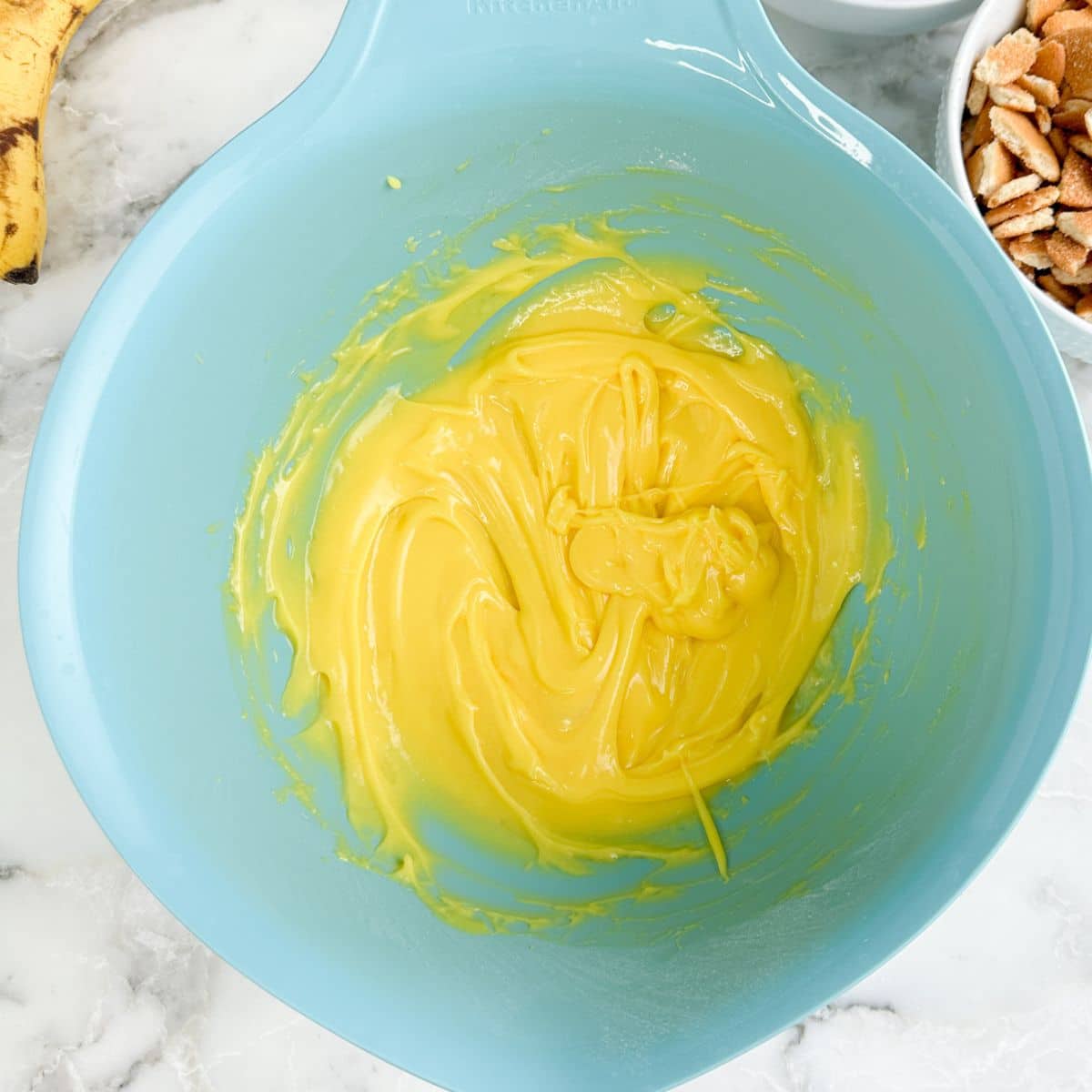Bowl with vanilla pudding.