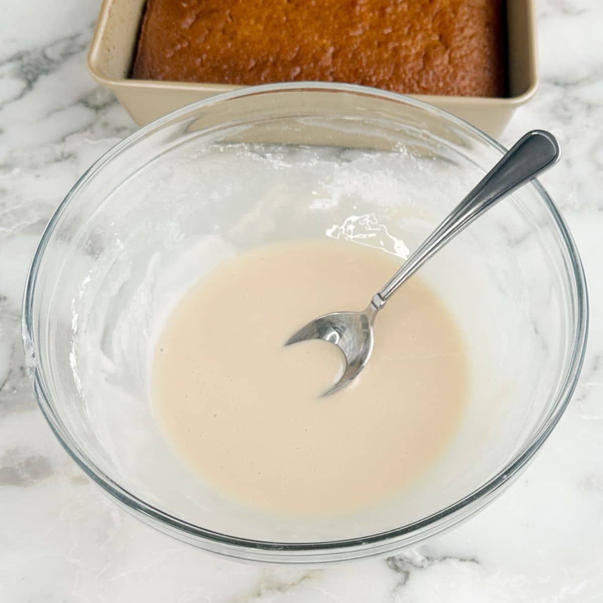 Bowl of root beer cake icing.