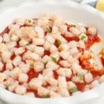 Baking dish with shrimp cream cheese dip.