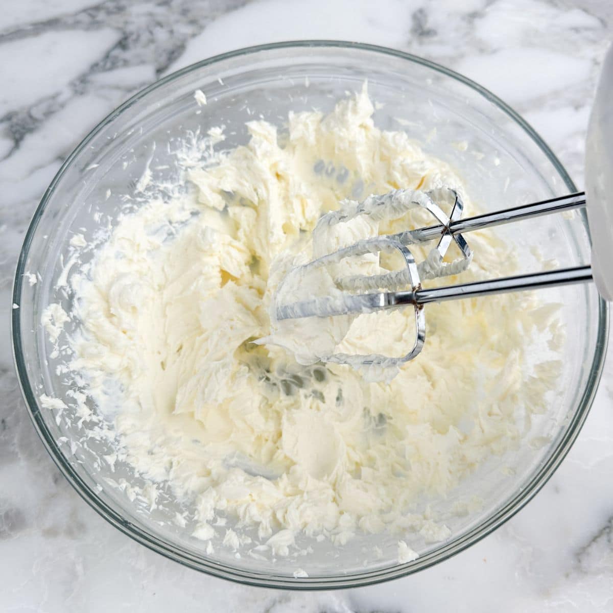 Bowl with whipped cream cheese. 