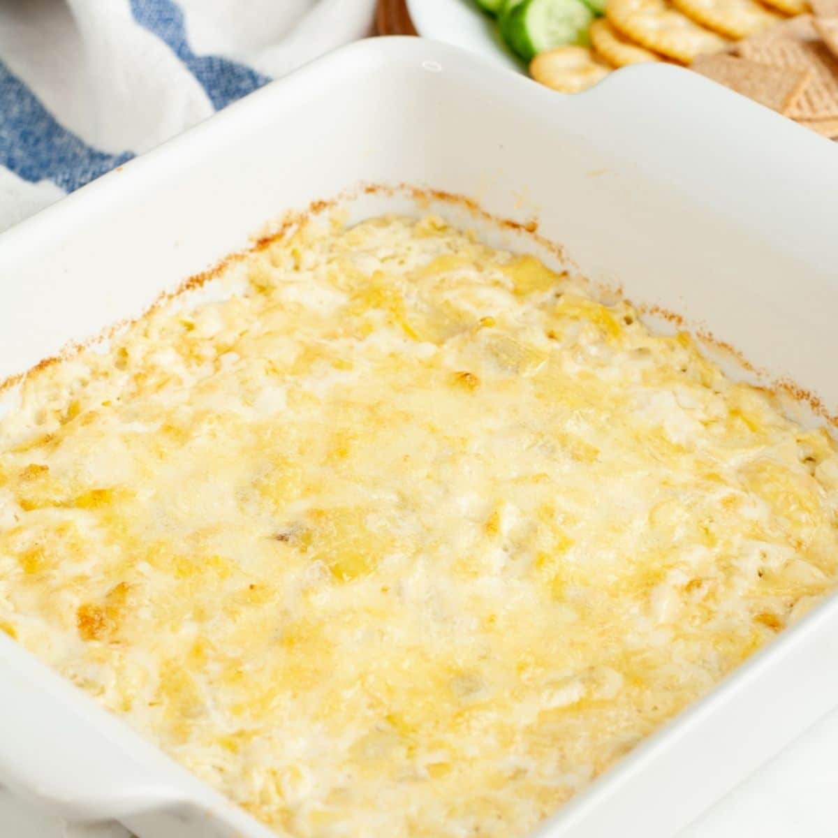 Baking dish with artichoke dip.