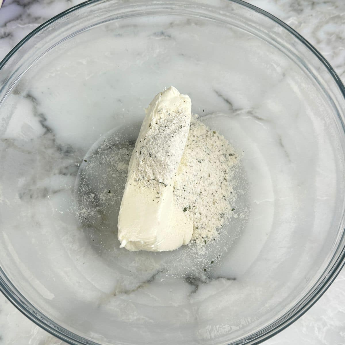 Bowl with cream cheese and ranch seasoning.