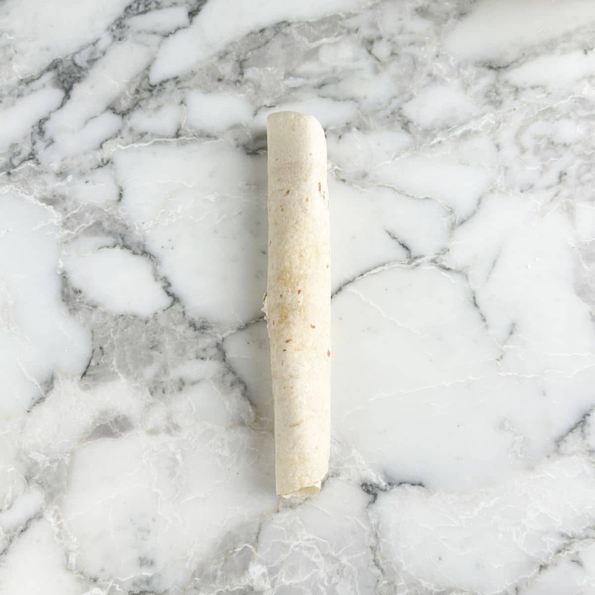 Rolled up tortilla pinwheel.