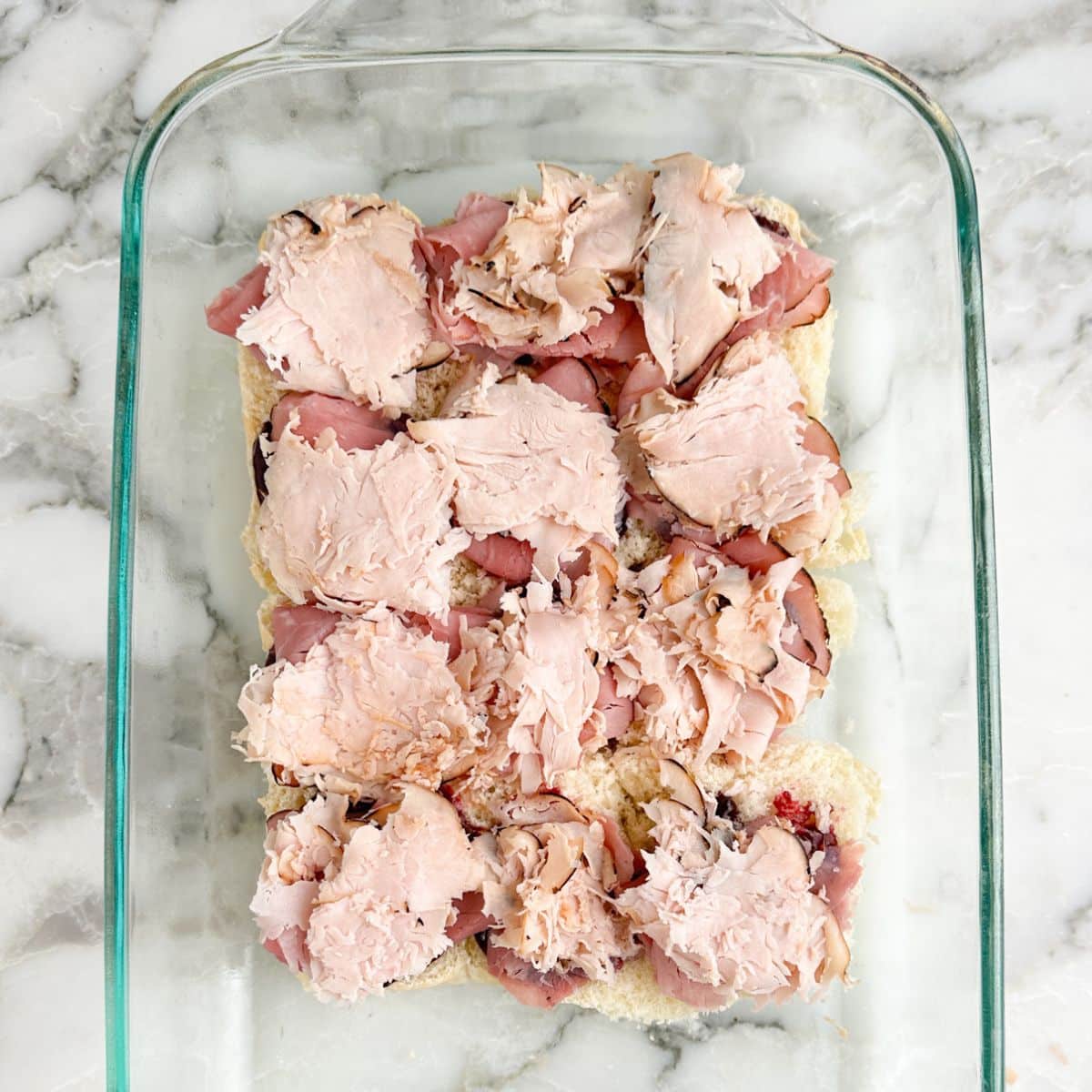 Slider rolls with turkey and ham.